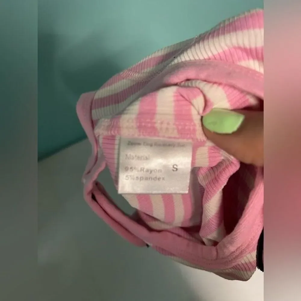 Small cat pink and‎ white onsie with strips